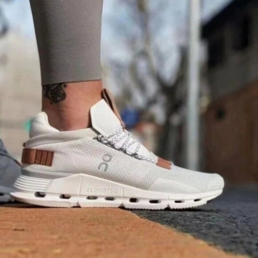 On Running white and tan running shoes